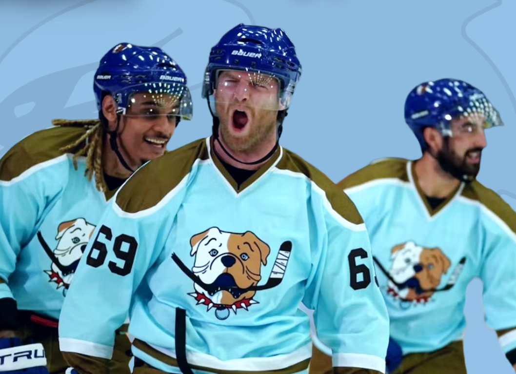 hockey players smile and yell wearing Blueberry Bulldogs jerseys for Shoresy Night in Sudbury. 