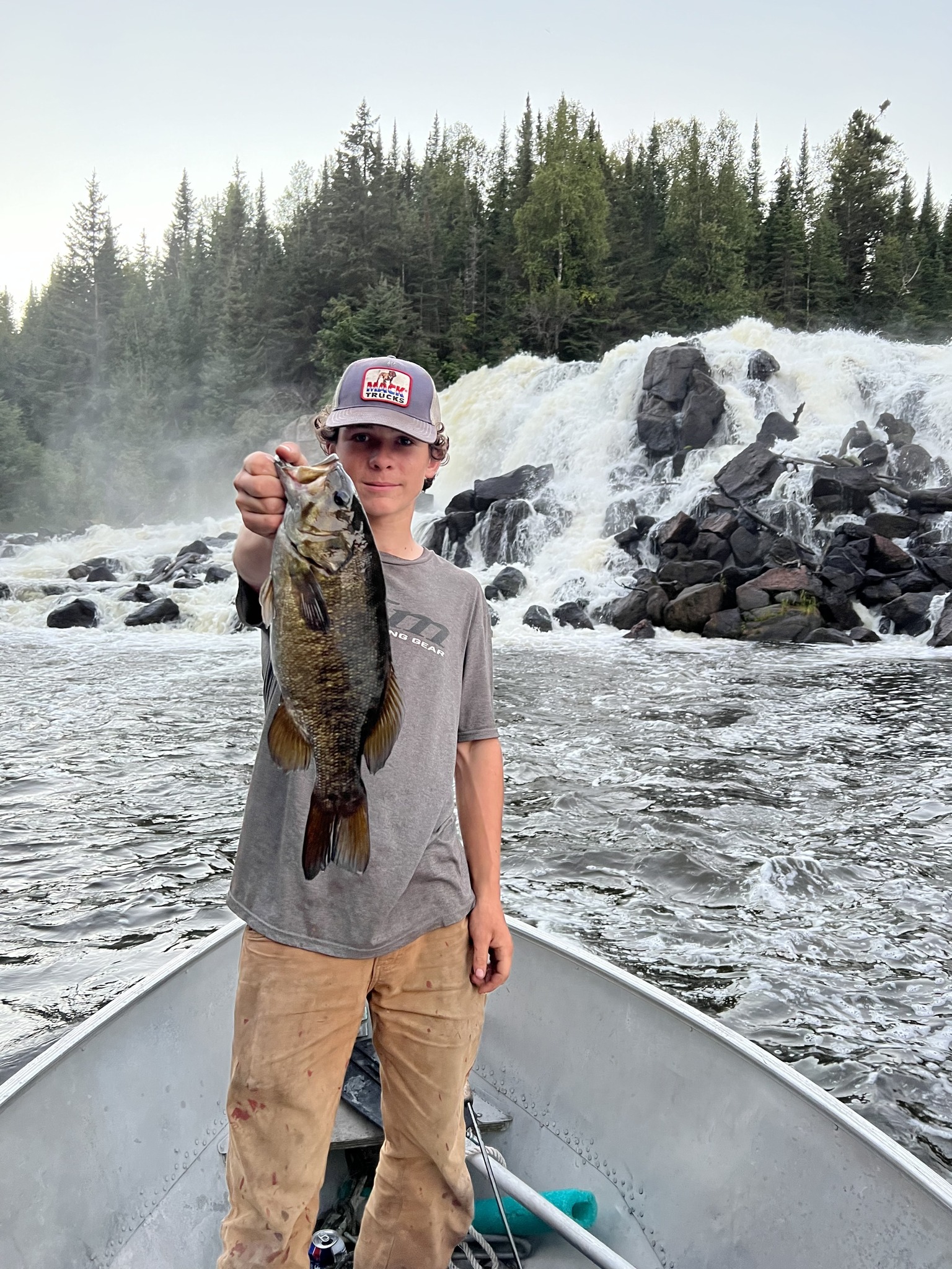 Fishing at the waterfalls on Roger Lake