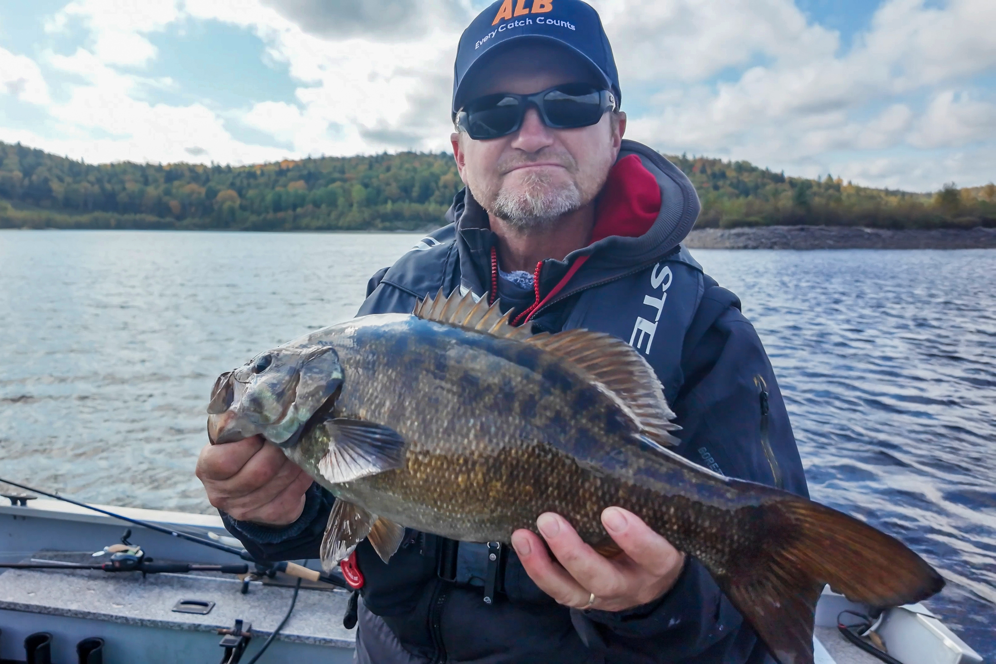 angler fishing smallmouth bass