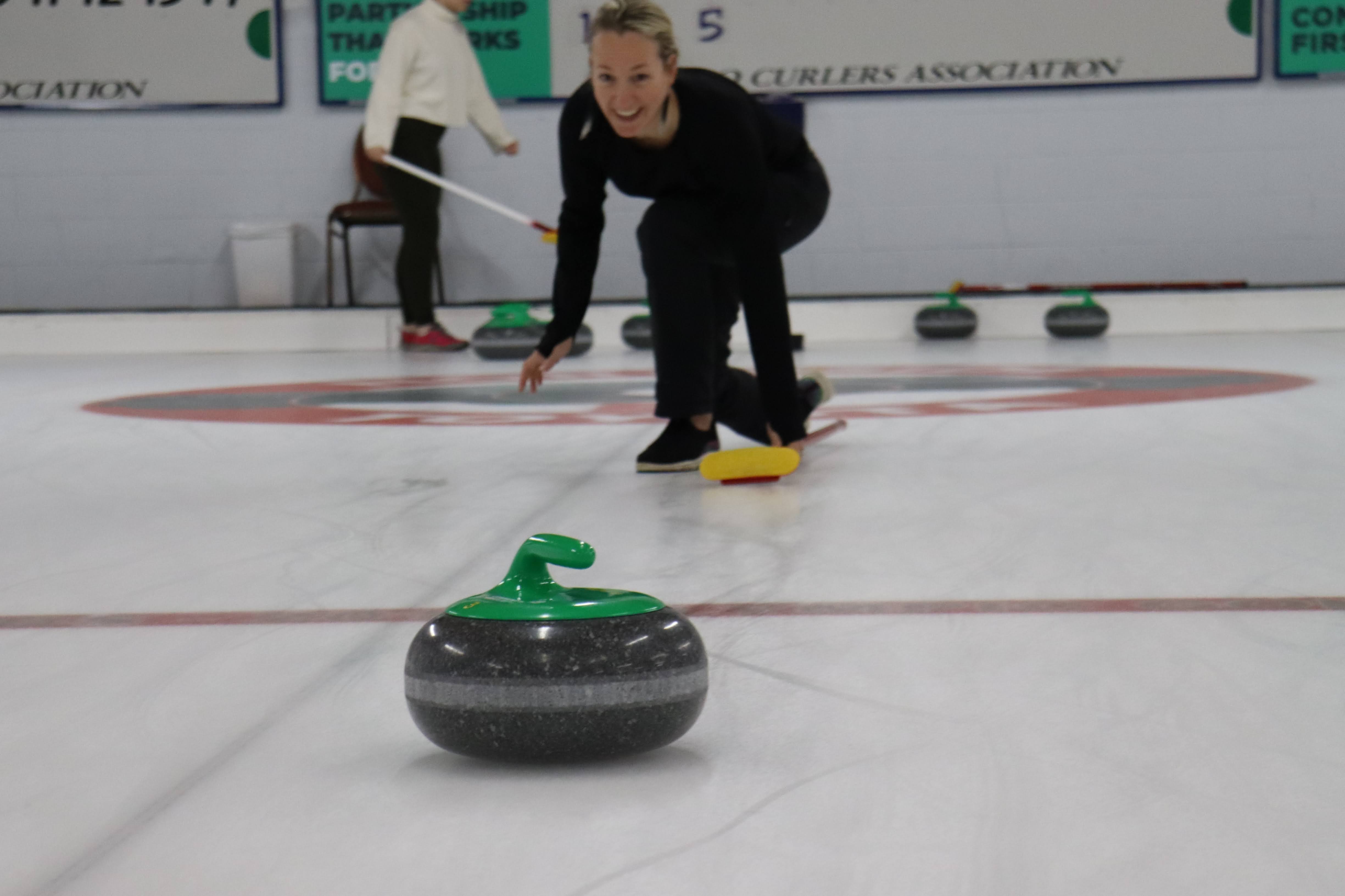 Woman Curling Photo by Nadine Robinson