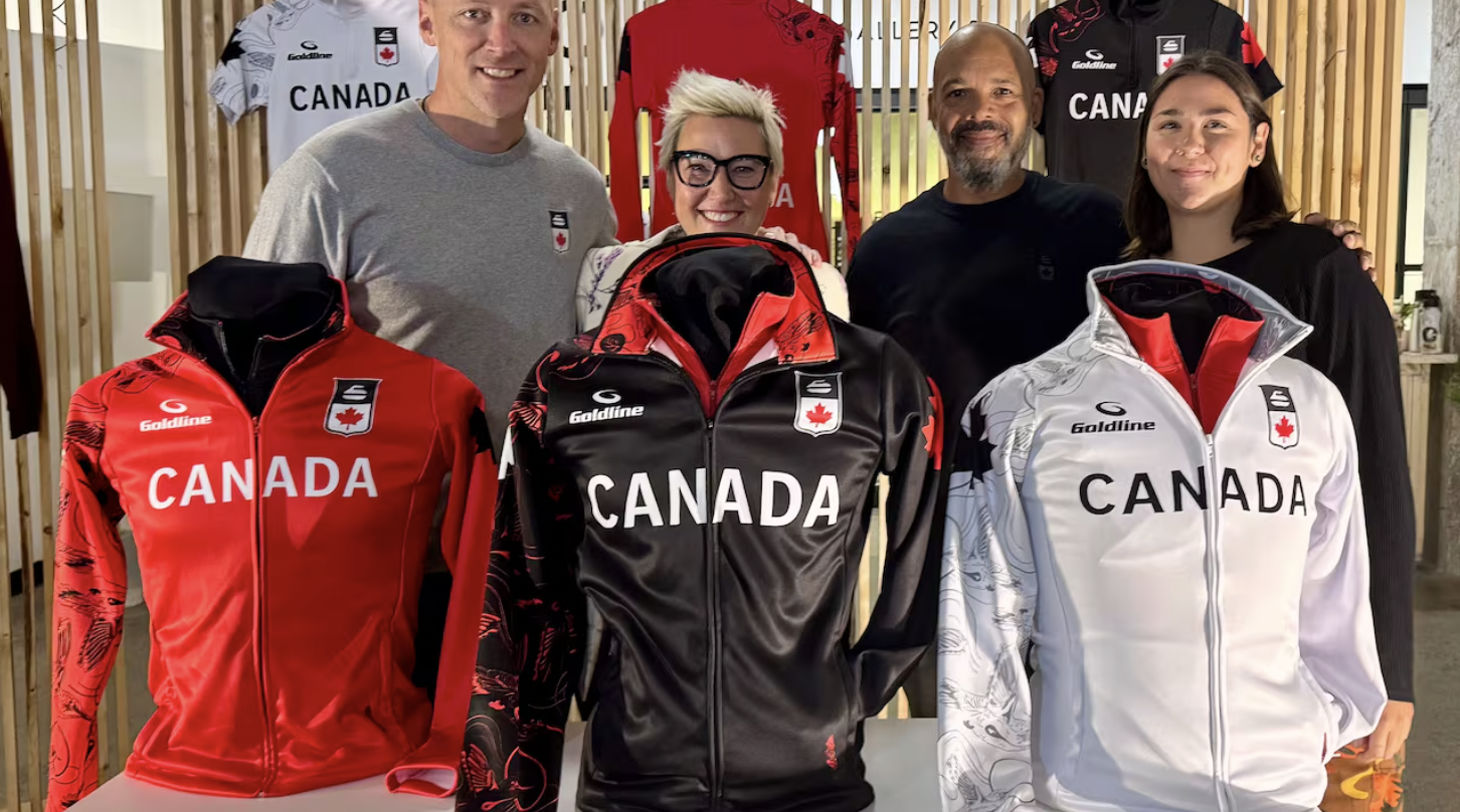 Indigenous artist Shelby Gagnon, right, and Goldline Curling president Erin Flowers, centre-left, are seen during the unveiling of Canada's Olympic curling uniforms for the 2026 Winter Games in Milano-Cortina. (Marc Doucette/CBC)