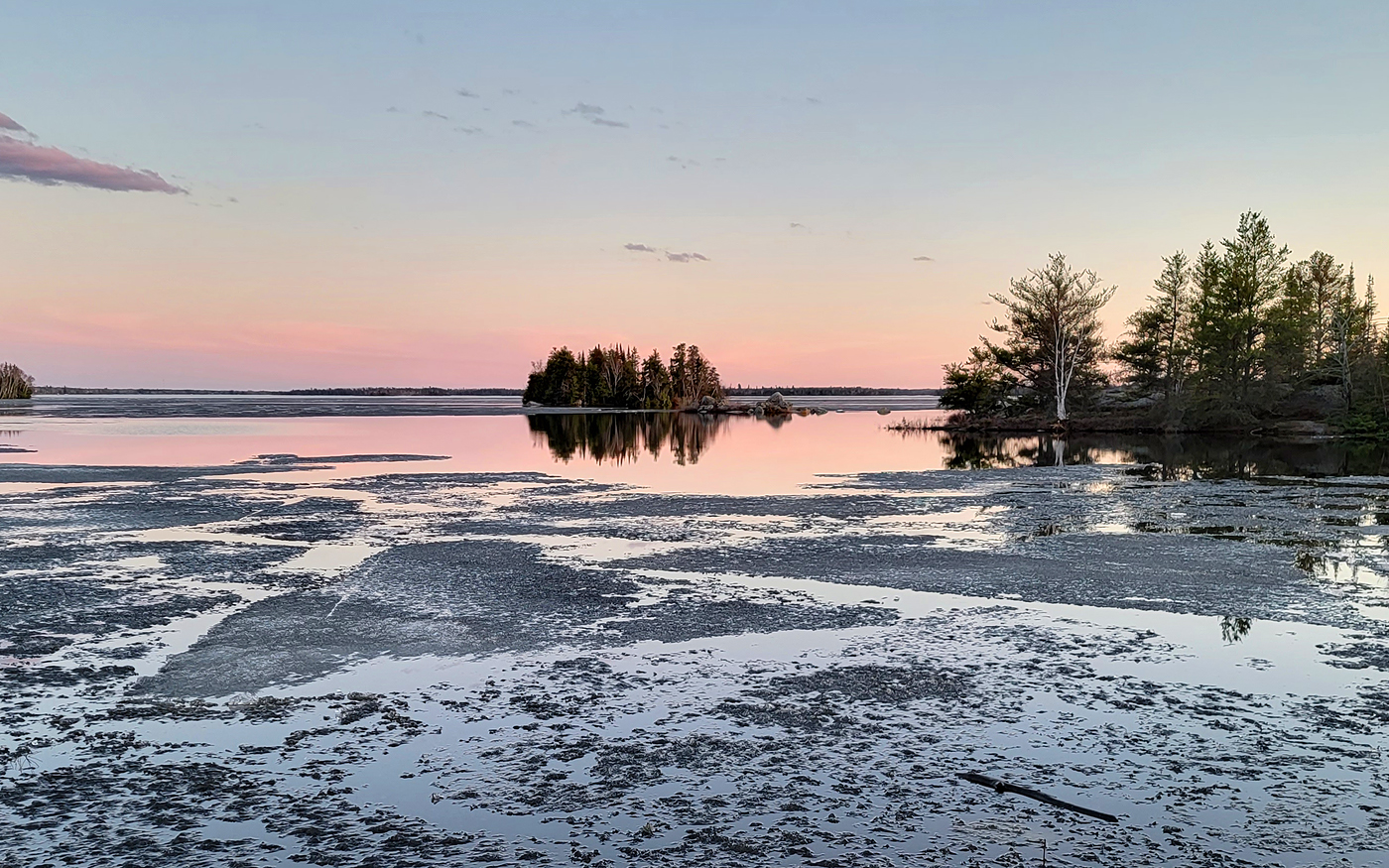 Ice Breaking up on lake in Spring Photo by Lana Law
