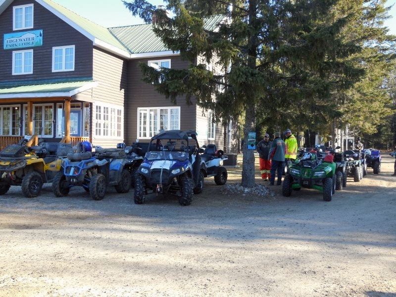 atvs parked on lot at edgewater park lodge kearney ontario