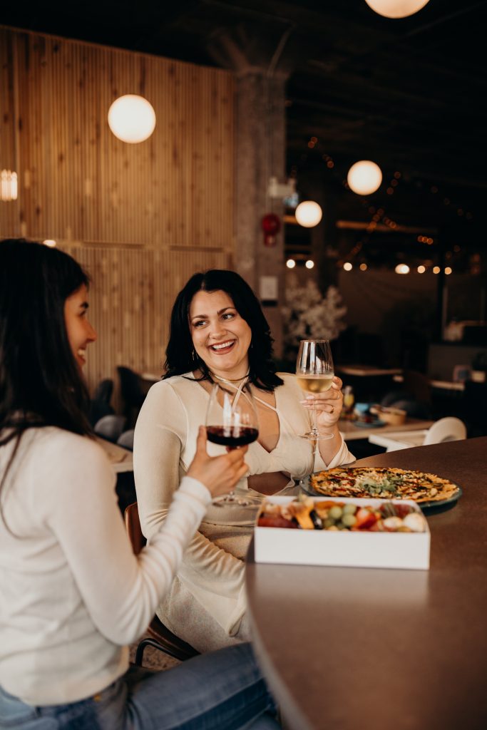 Grabbing a glass of wine at the Woodside Bar at Goods & Co.
