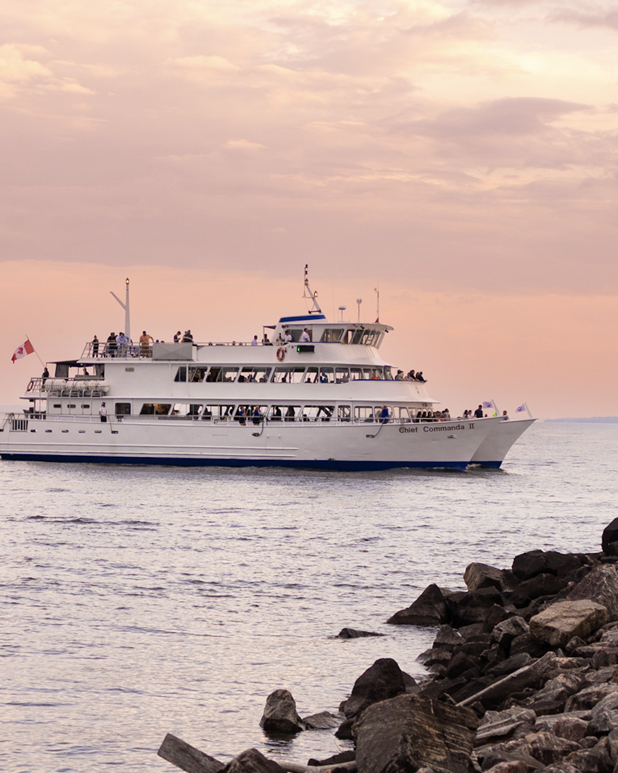 Chief Commanda II on the water at sunset