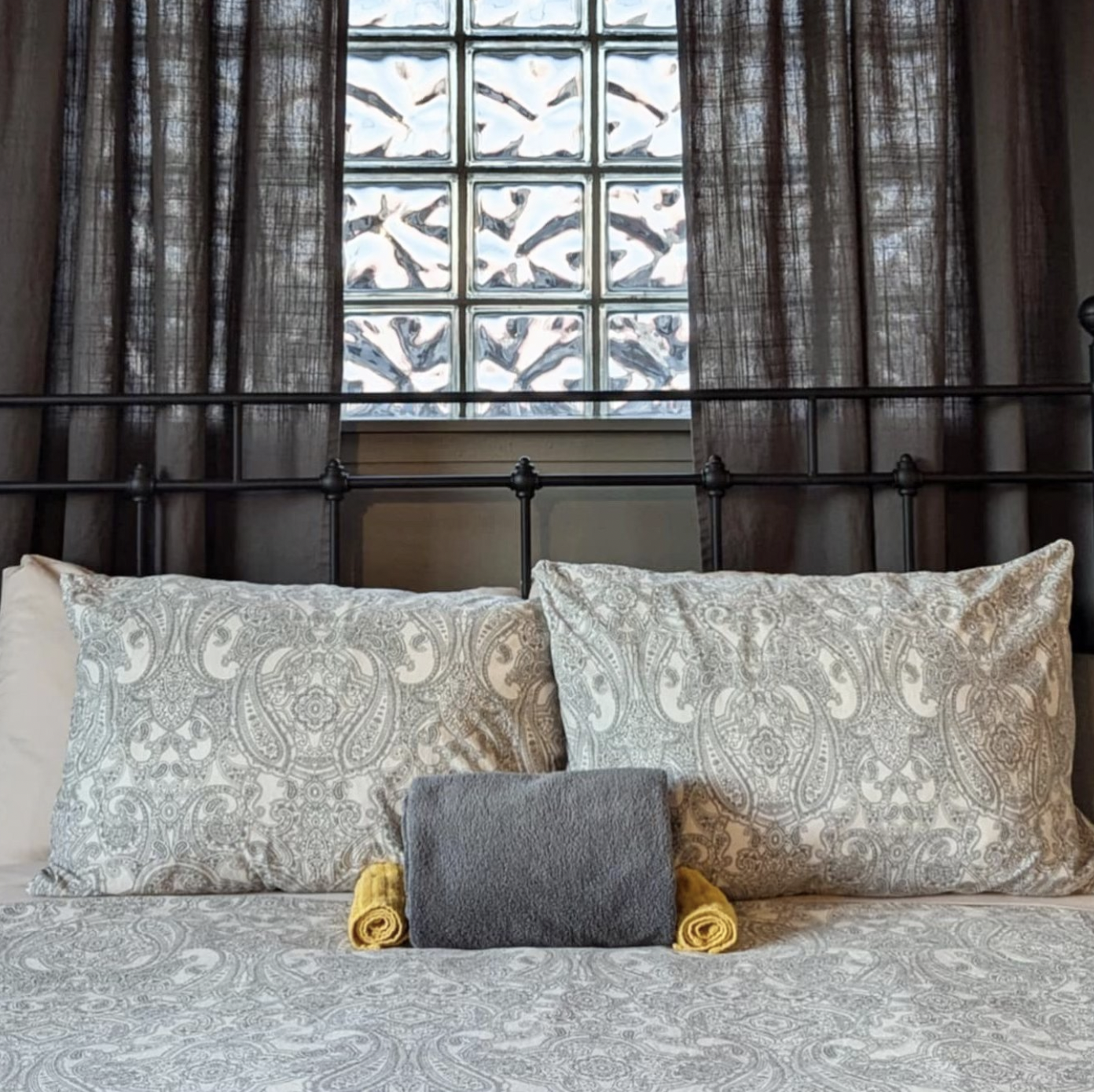 a cozy bedroom at Haven Hostel