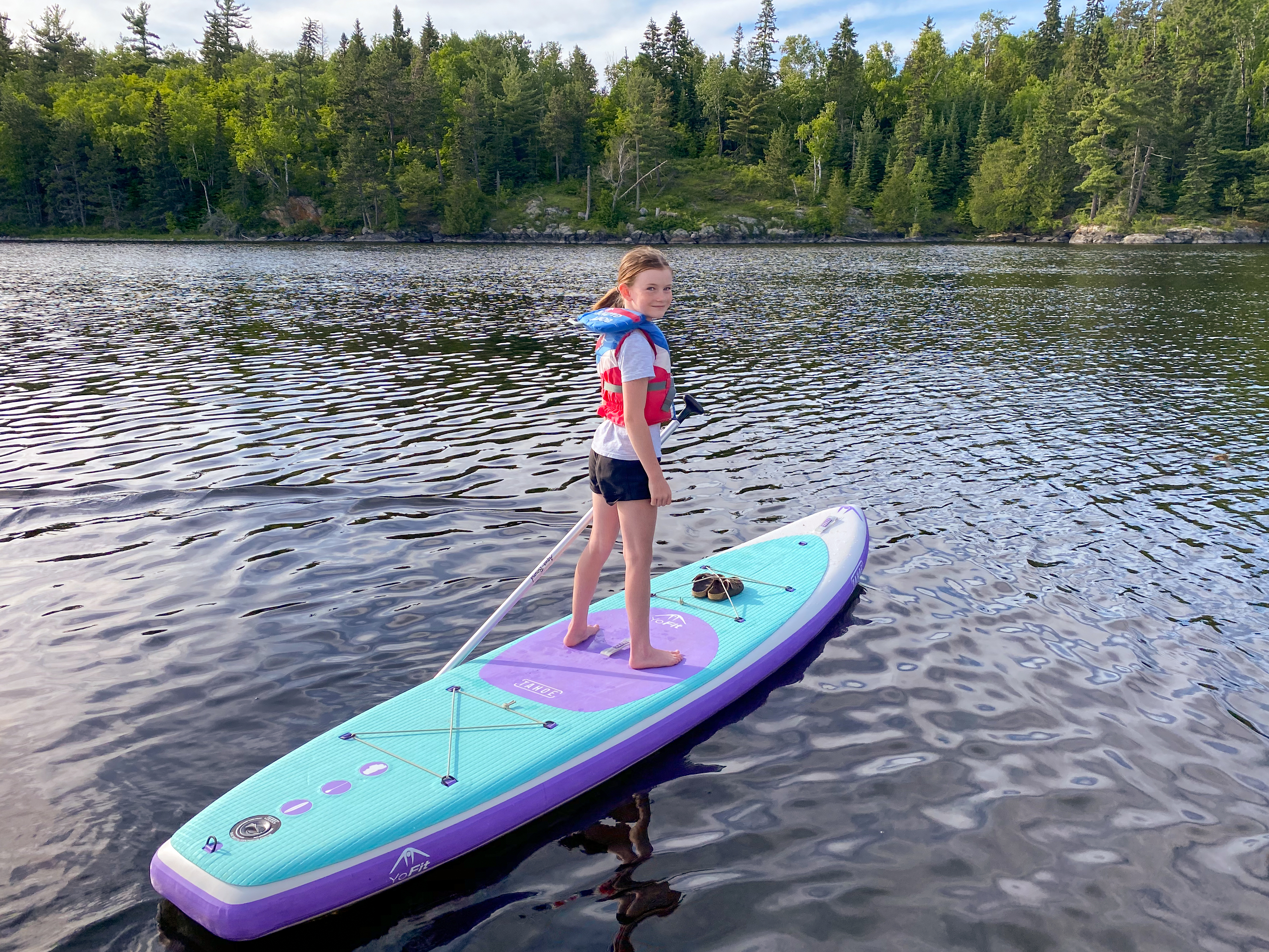 Enjoy stand-up paddle boarding on lakes around Vermilion bay.