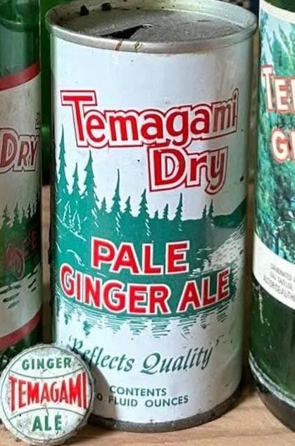 A vintage can of Temagami Dry ginger ale and an original bottle cap