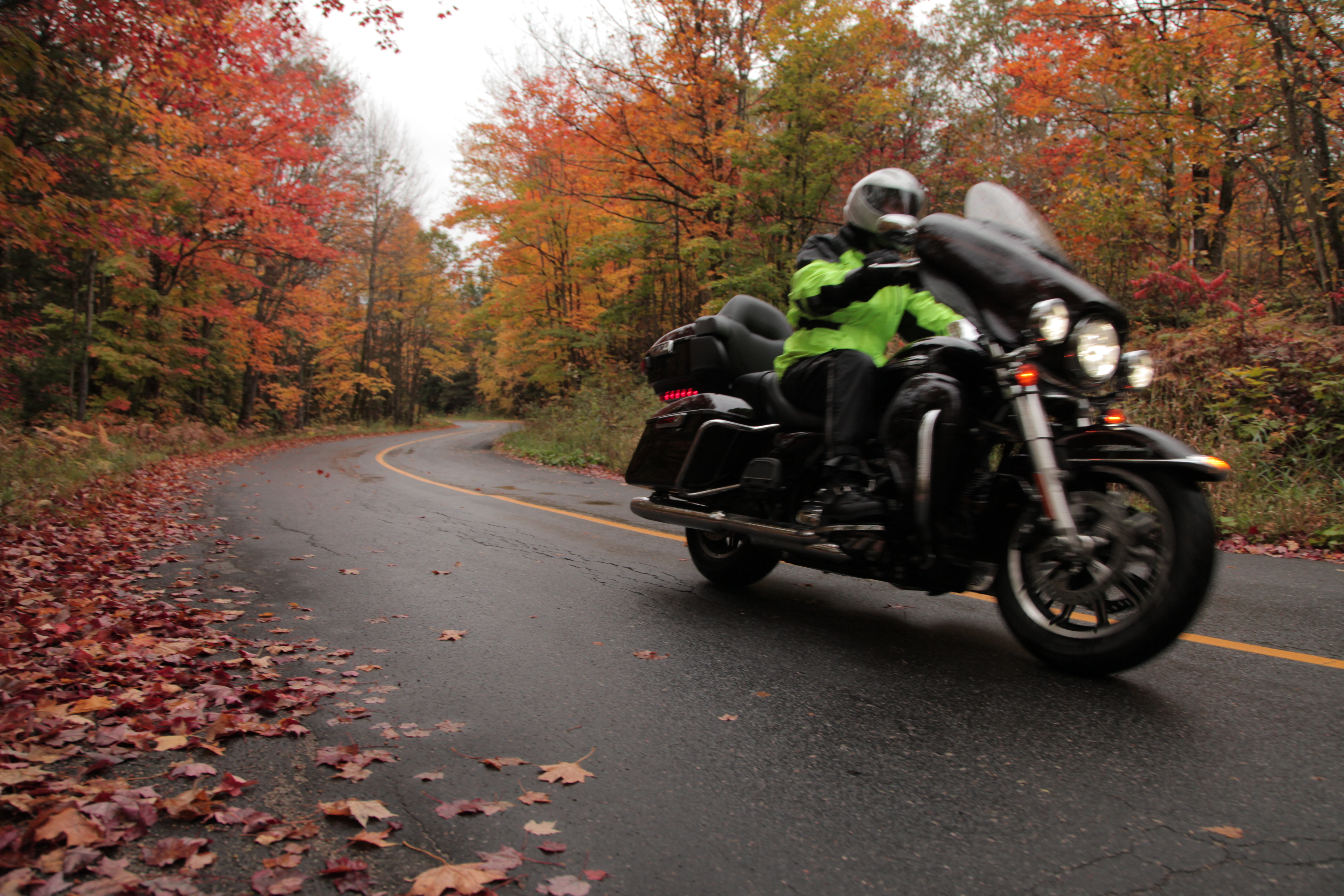 Motorcycle rider ready for rain