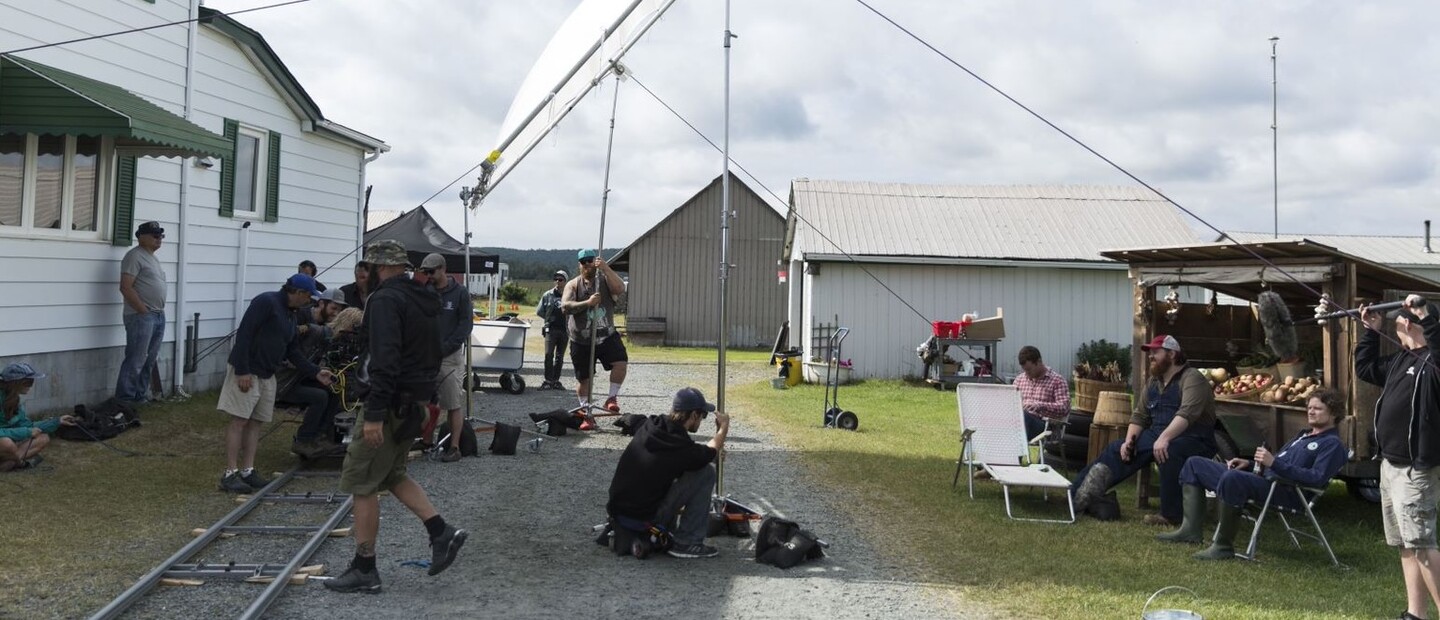lighting, cameramen and actors bustle around an outdoor set near Sudbury during a film shoot for Letterkenny.