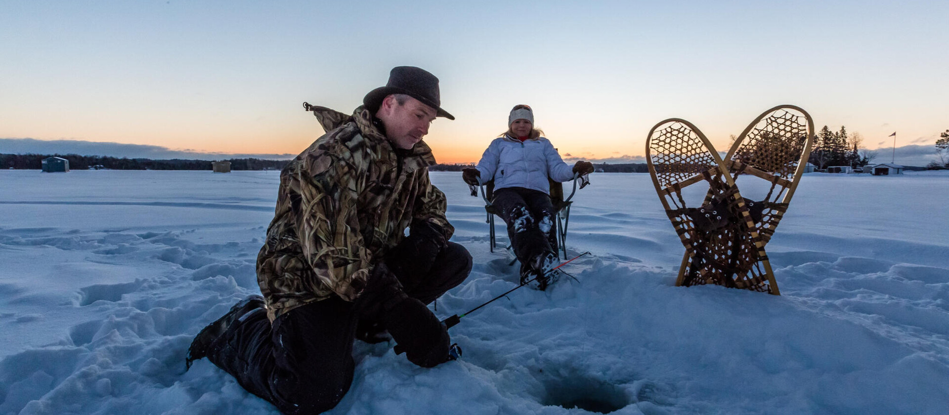 Couples Ice Fishing on Lake Nosbonsing