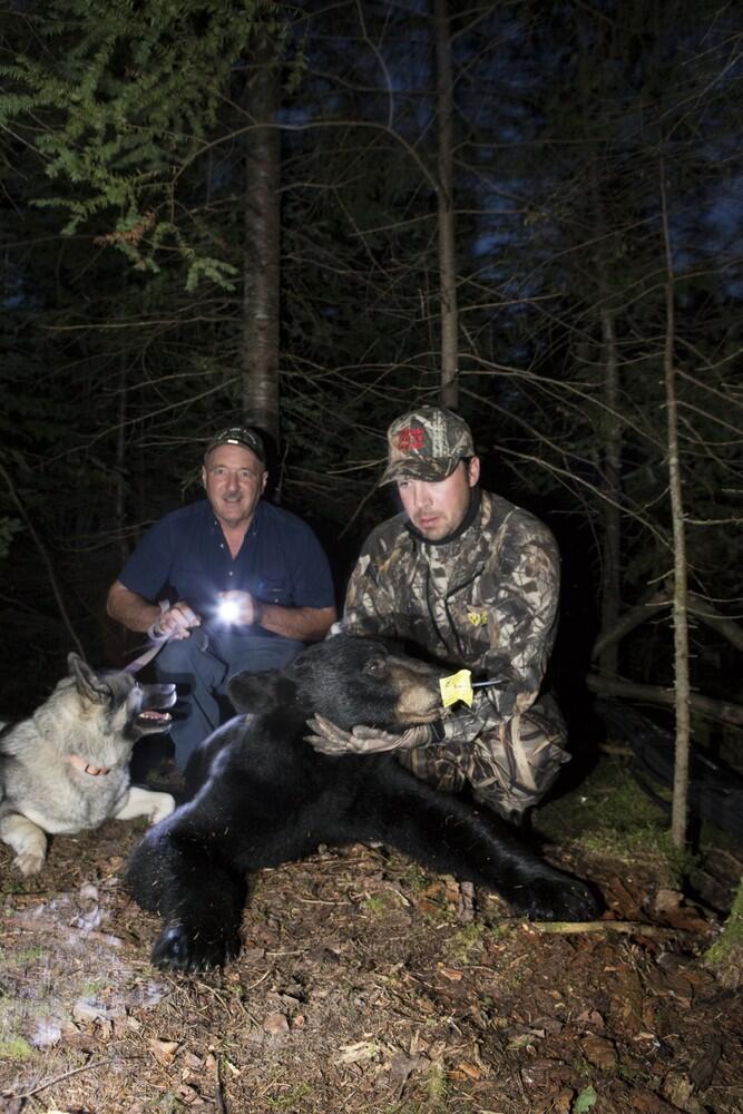 Gary Litt and his elkhound with black bear