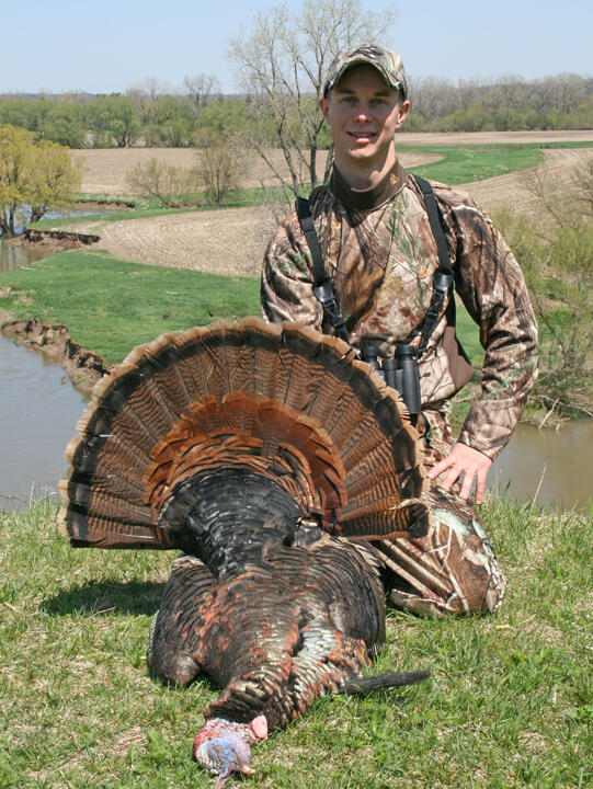One of the Beasley brothers poses with his Turkey harvested in Ontario