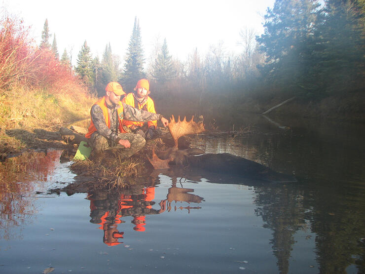 Tom Armstrong and brother-in-law Jay after a successful riverâ€™s edge moose hunt in Northwestern Ontario