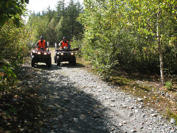 Two ATVs hit the Trails at Gowganda Lake Lodge