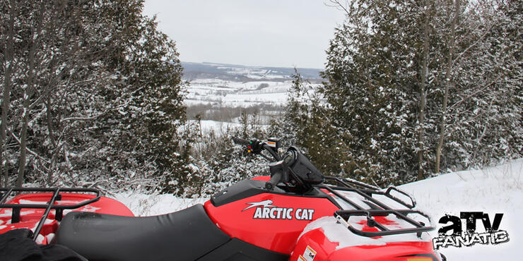 Arctic Cat 700 ATV in the snow 04