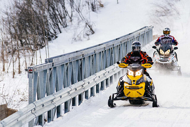 cool dudes on snowmobiles