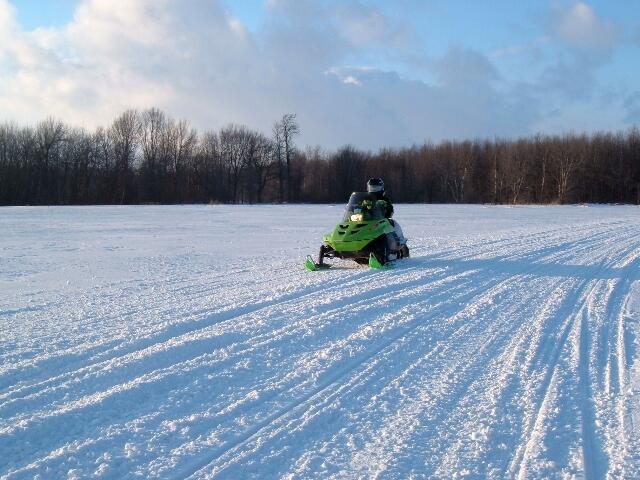 Green sled in open field