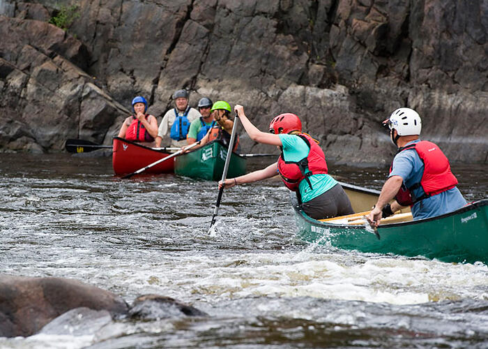 Practicing-paddle-strokes-at-the-base-of-Rock-Island-Rapids