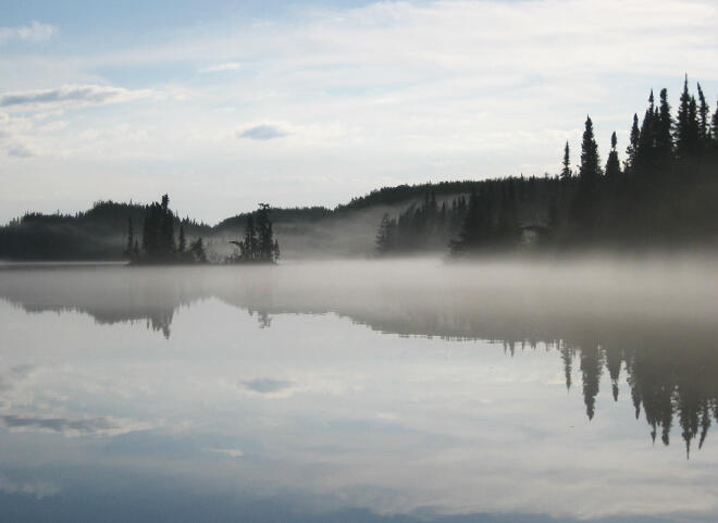 Mist rising from the waters at Big Hook Wilderness Camps