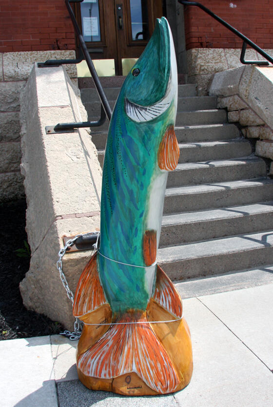 Beautifully carved muskie by Carol Henderson outside of Kenora City Hall