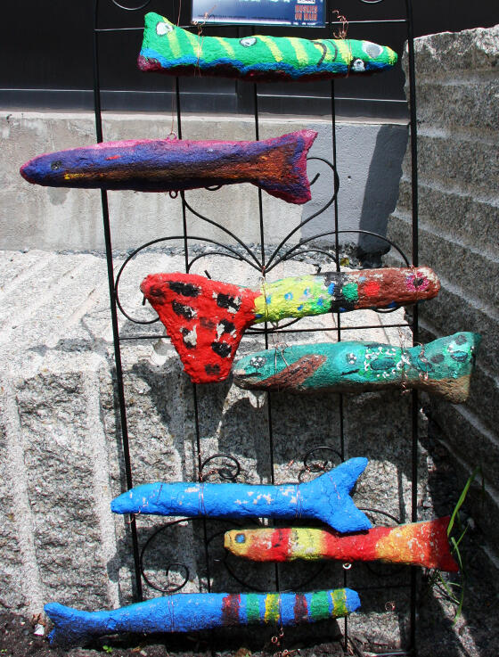 Young artists made these muskies from using rolled paper, tape, webbing and concrete. 