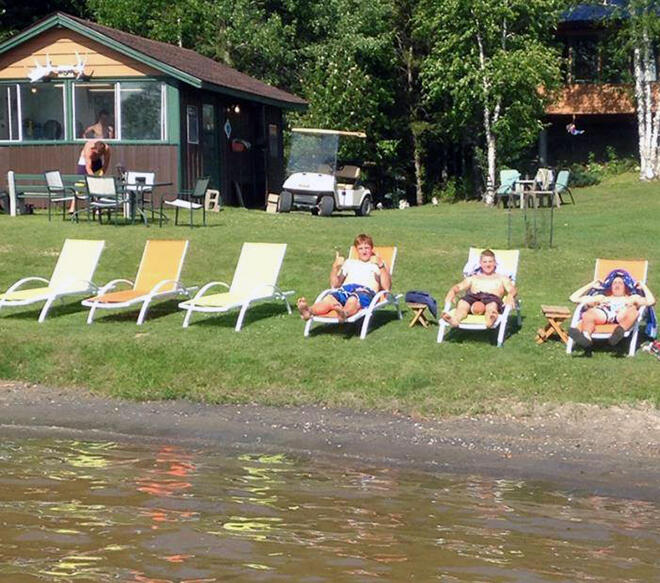 Relax and take in the sun waterside at Bonny Bay Camp