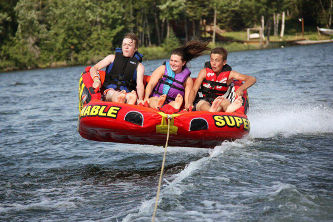 Tubing on Clearwater Lake at True North Outpost & Cabins