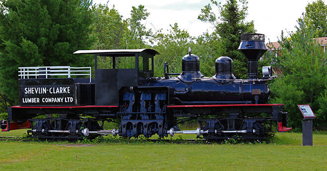 Shevlin-Clark Timber Display Train onthe Centennial Museum grounds