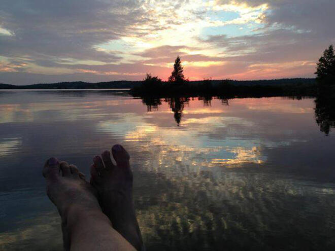 Watching the sun set over water at Ignace Outposts