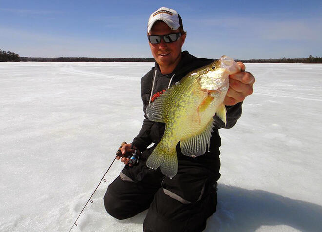 Sean with a nice Spring crappie on Lake of the Woods