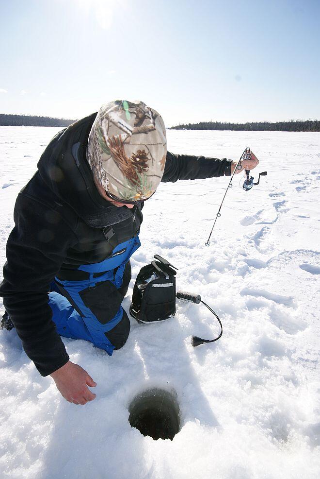 Battling lake trout Lake Superior ice