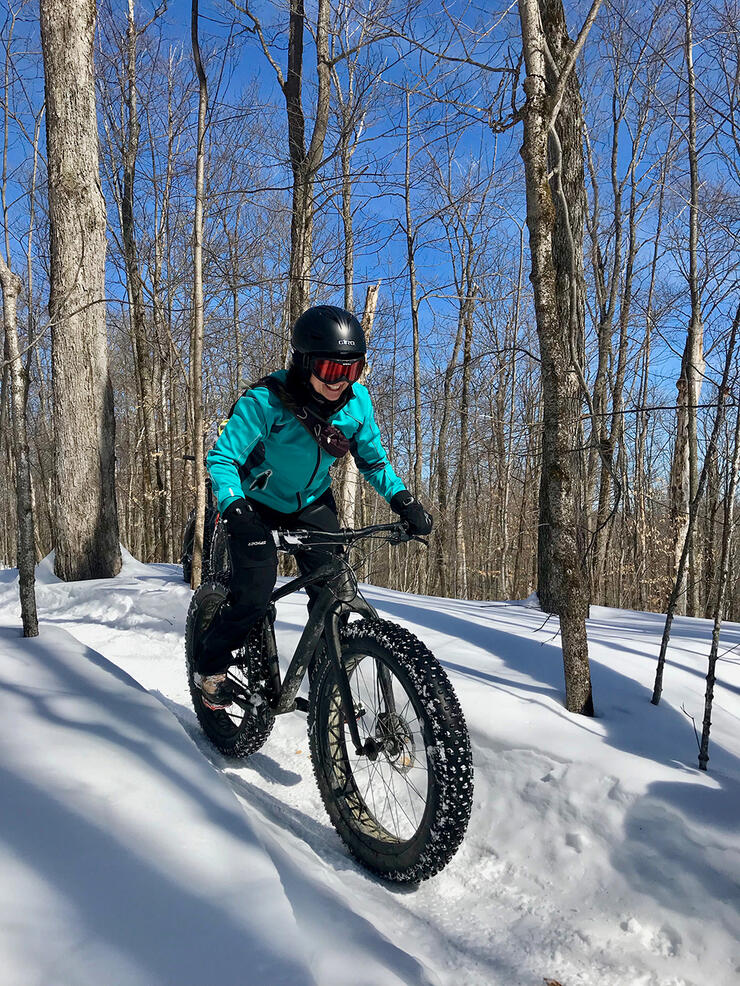 Connie organized an International Women's Day event for women in the North Bay community to try fat biking. Thirty women participated and all three bike shops in North Bay provided fat bikes for participants to use. Pictured here is Connie's friend, Geraldine rocking the winter riding! Photo:Â Connie Hergott