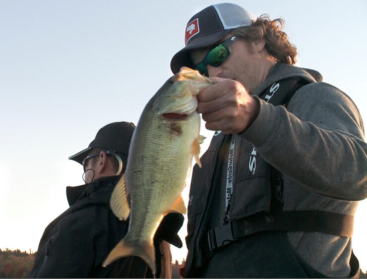 tyler dunn guiding with largemouth bass