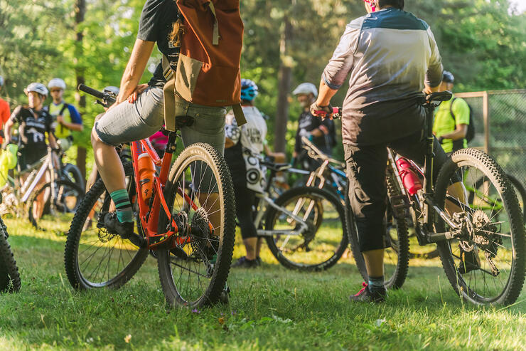 Group of stationary cyclists. 