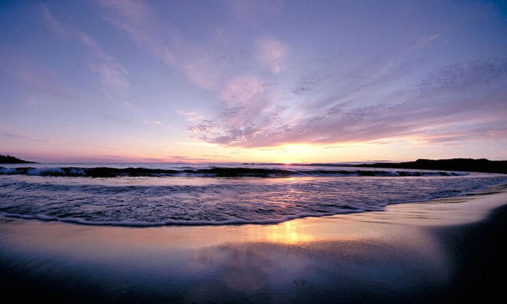 Beautiful pinky purple sunset over Lake Superior beach 