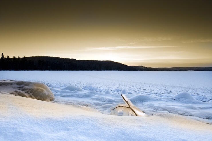 Peaceful winter scene of a frozen lake