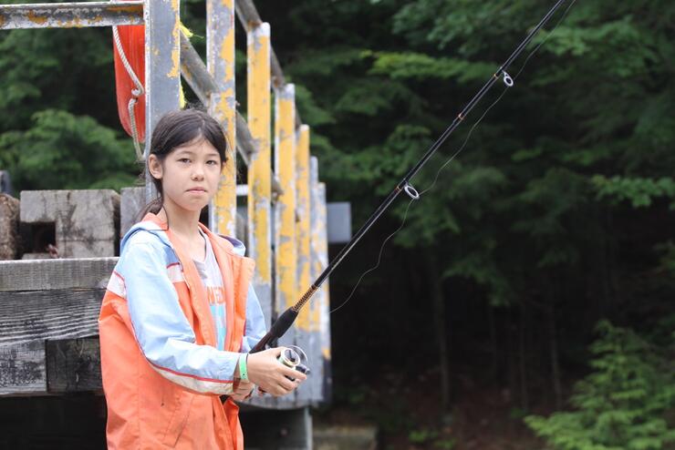 Girl with fishing pole