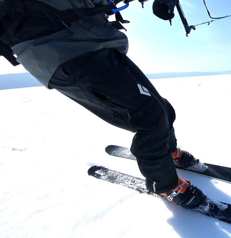 Close up of safety harness on a person snowkiting.