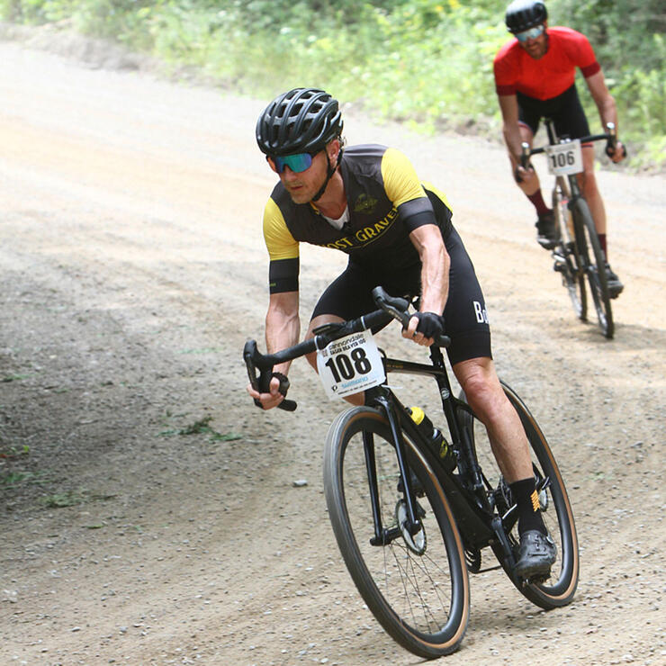 two men ride gravel bikes in the Cannondale Eager Beaver race