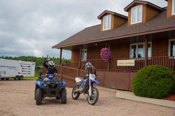 Miesha Tate and Bryan Caraway suiting up for a ride at Cedar Gables Lodge in North Bay, Ontario
