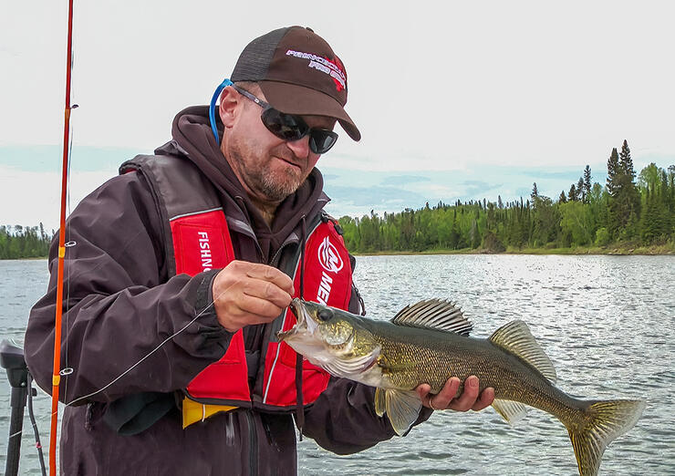 angler fishing walleye