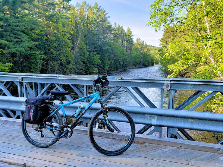 Touring bicycle parked on a footbridge at Samuel de Champlain Provincial Park