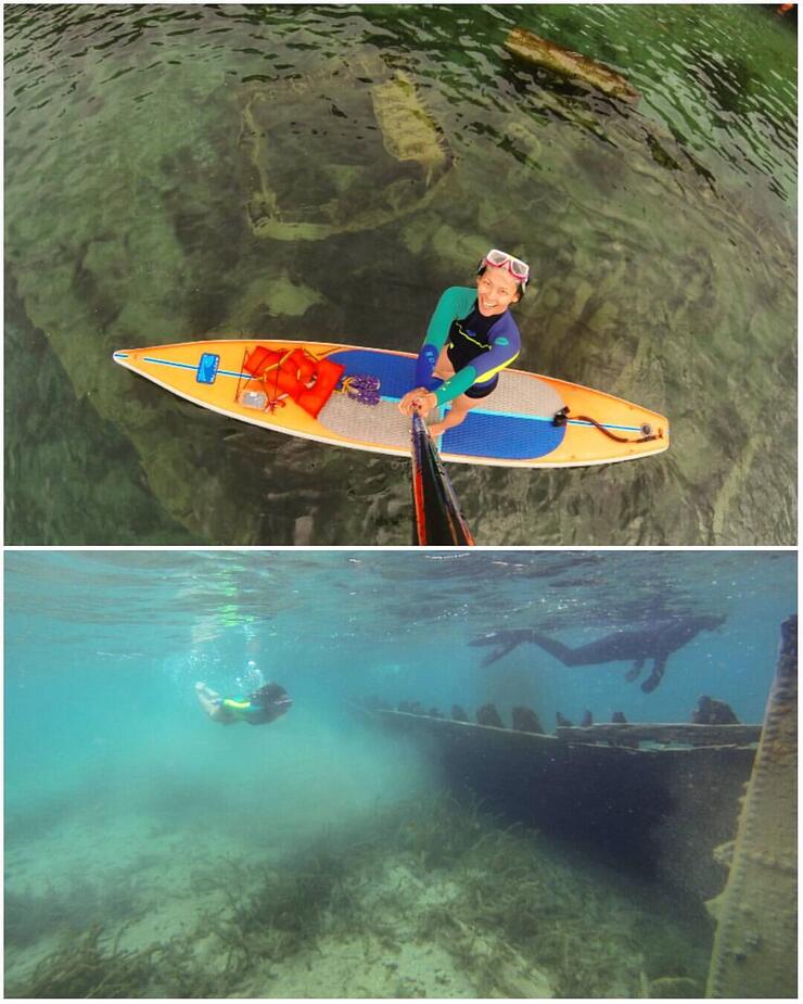 woman paddles a SUP and snorkels at a shipwreck site near Tobermory, Ontario