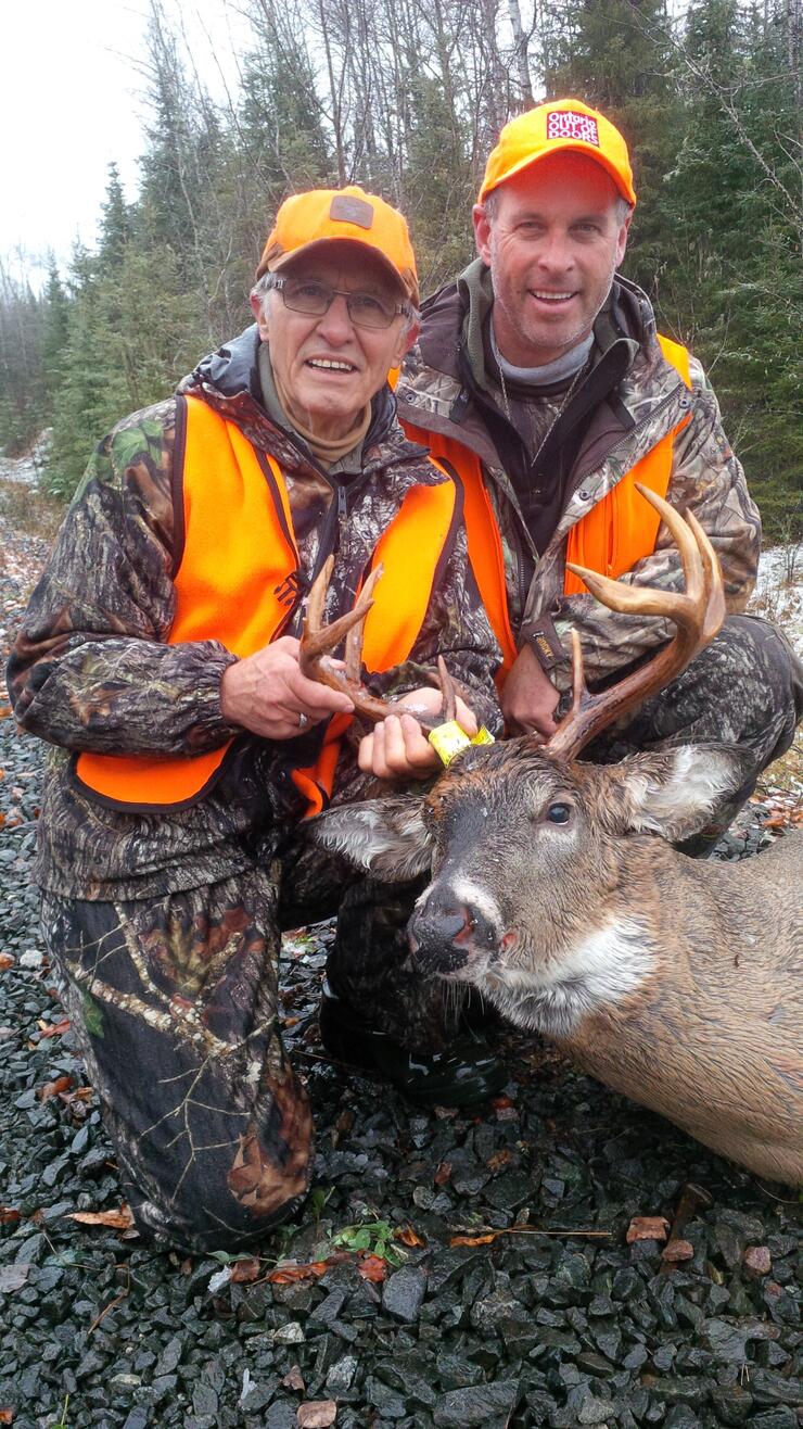 hunter with harvested deer