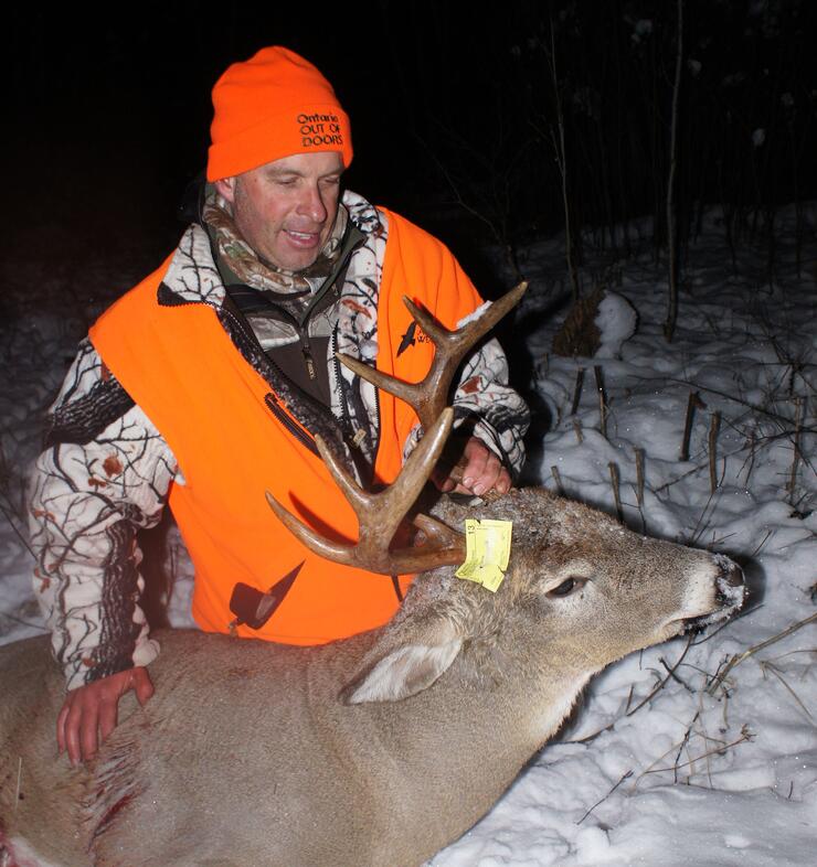 hunter with harvested deer