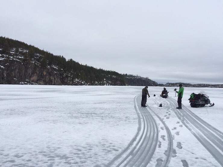 Ice Fishing Trout Mid Winter on Deep Water Structure 