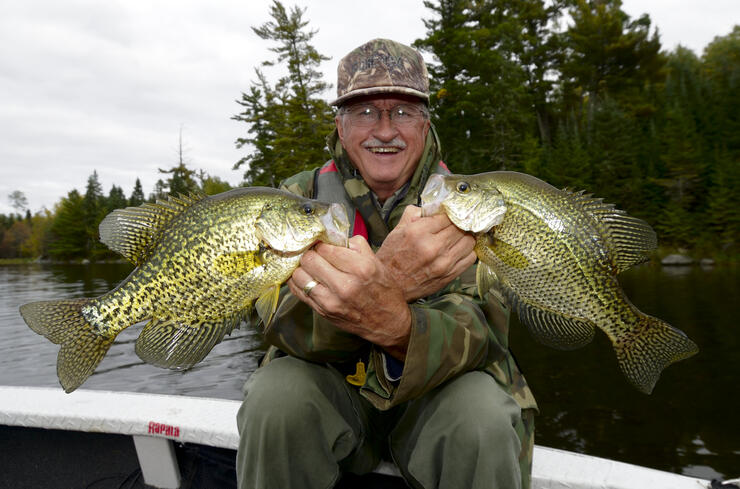 angler with black crappie