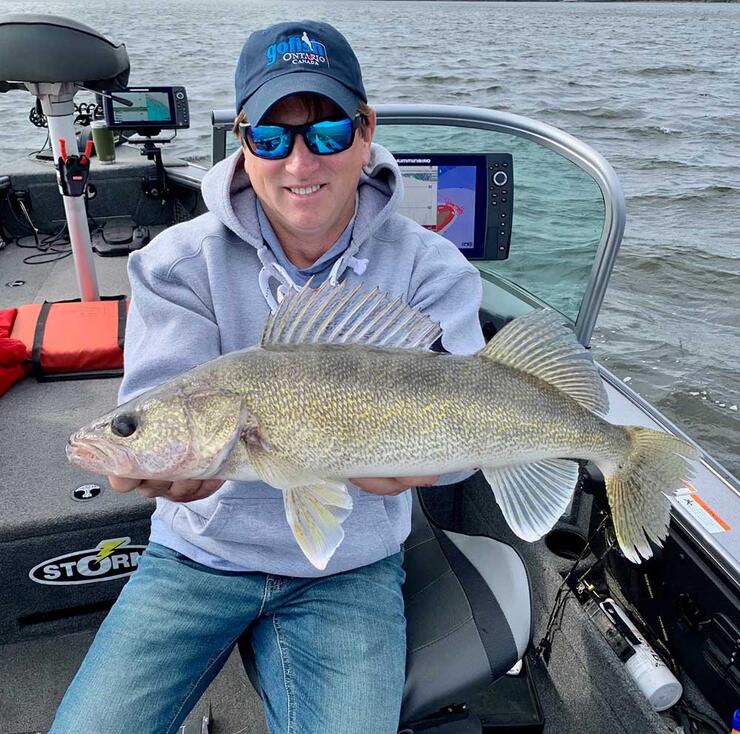 angler fishing walleye