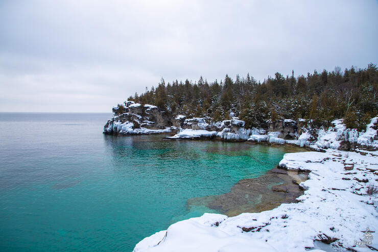 Shore of Georgian Bay with ice formations on cliffs